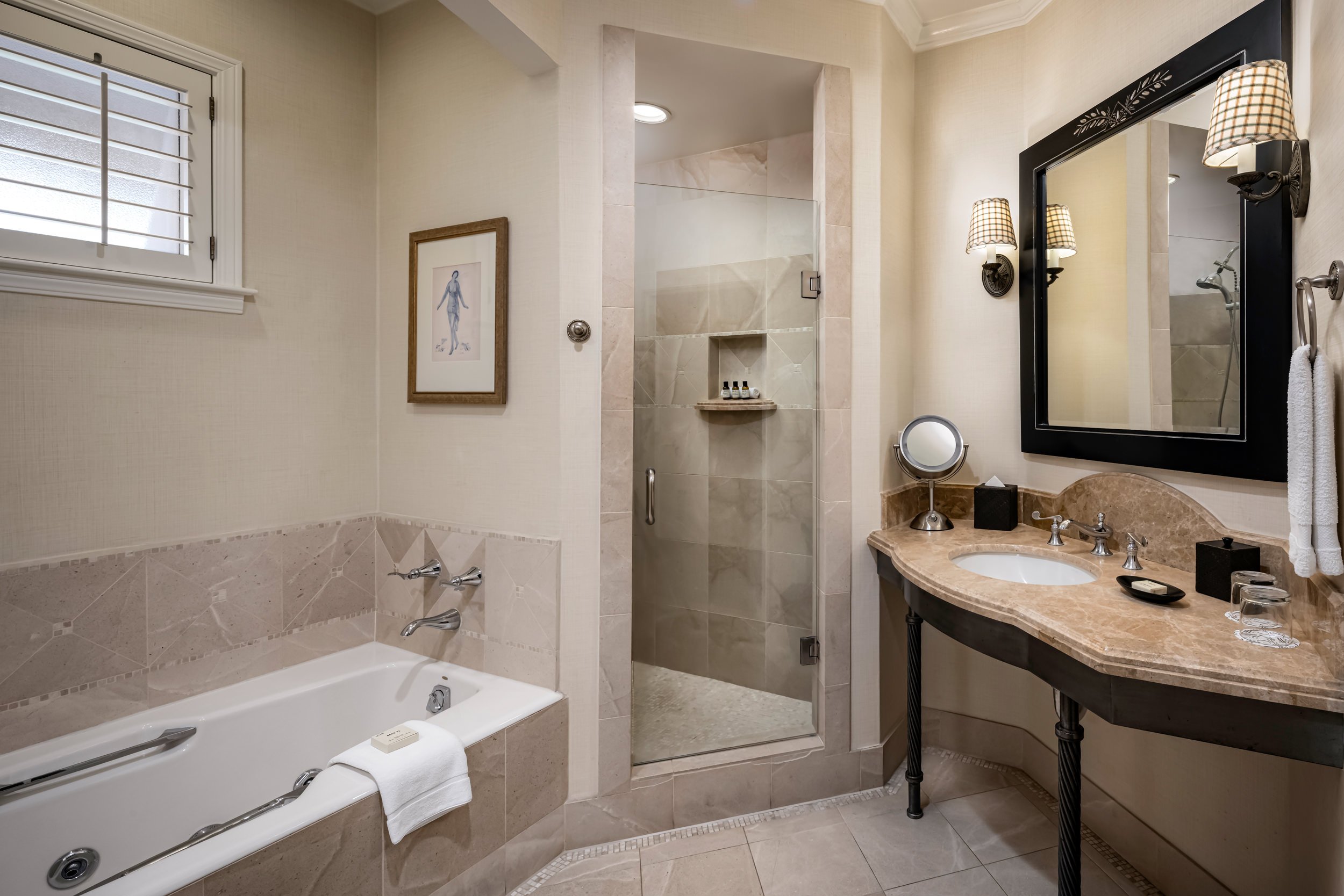 bathroom with walk-in shower and tub