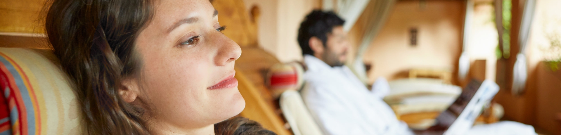 A couple lounging in robes