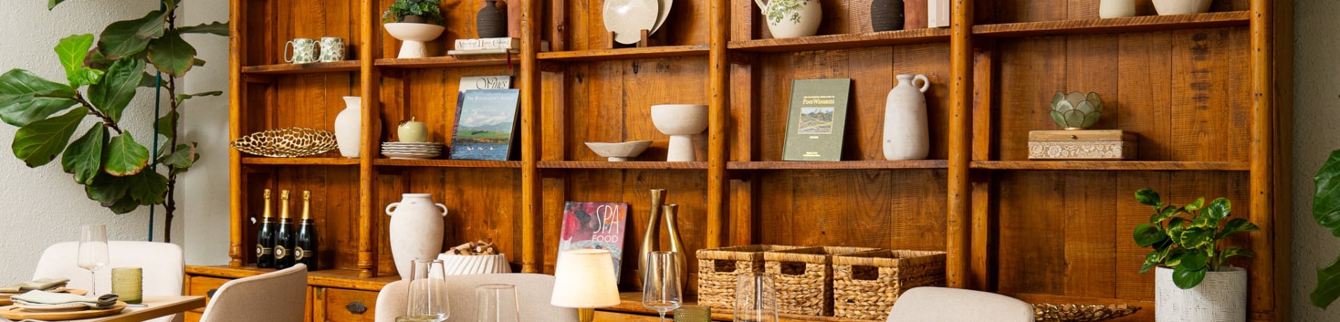 Large built in bookshelf with cozy restaurant seating