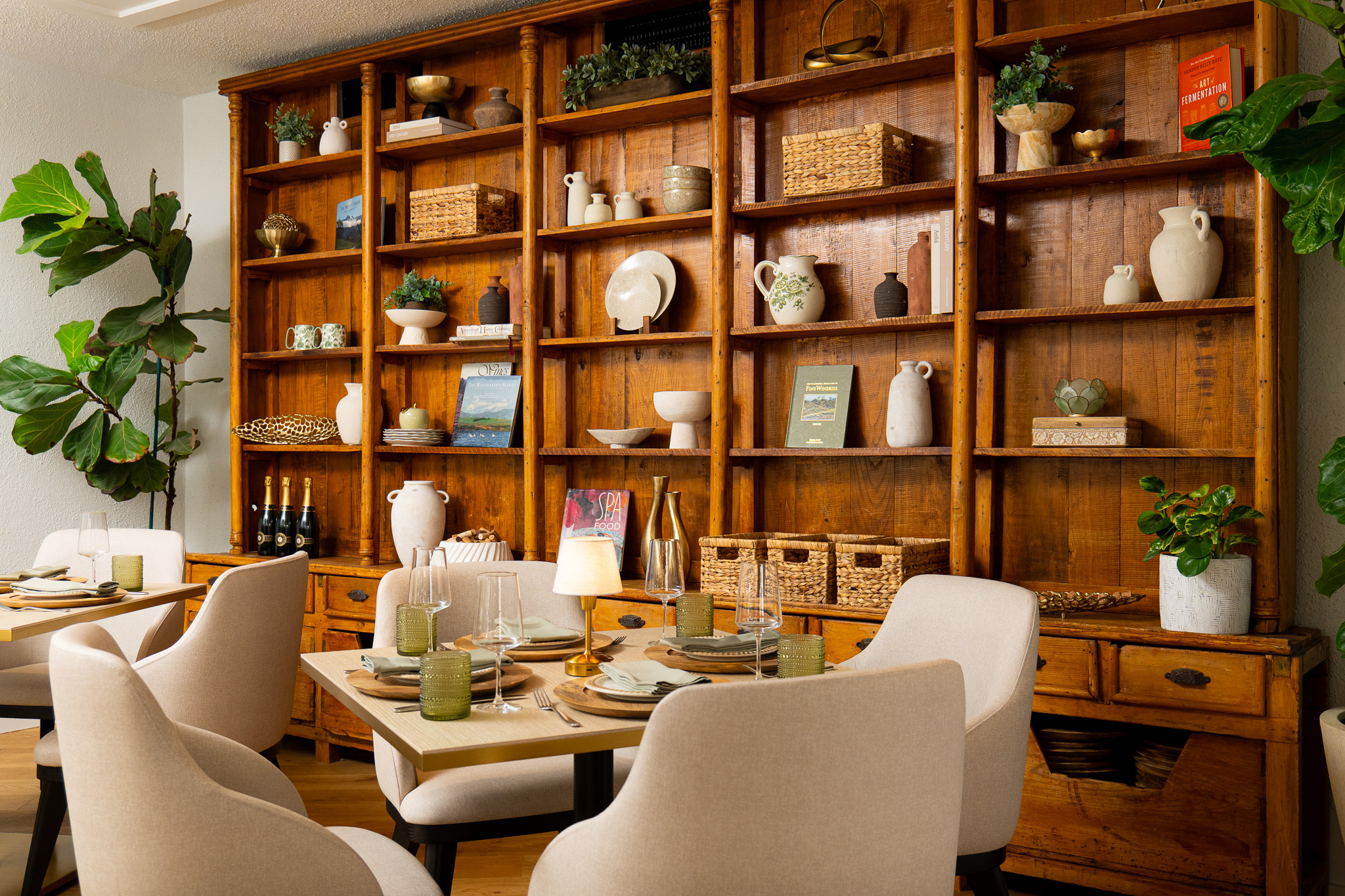 Large built in bookshelf with cozy restaurant seating