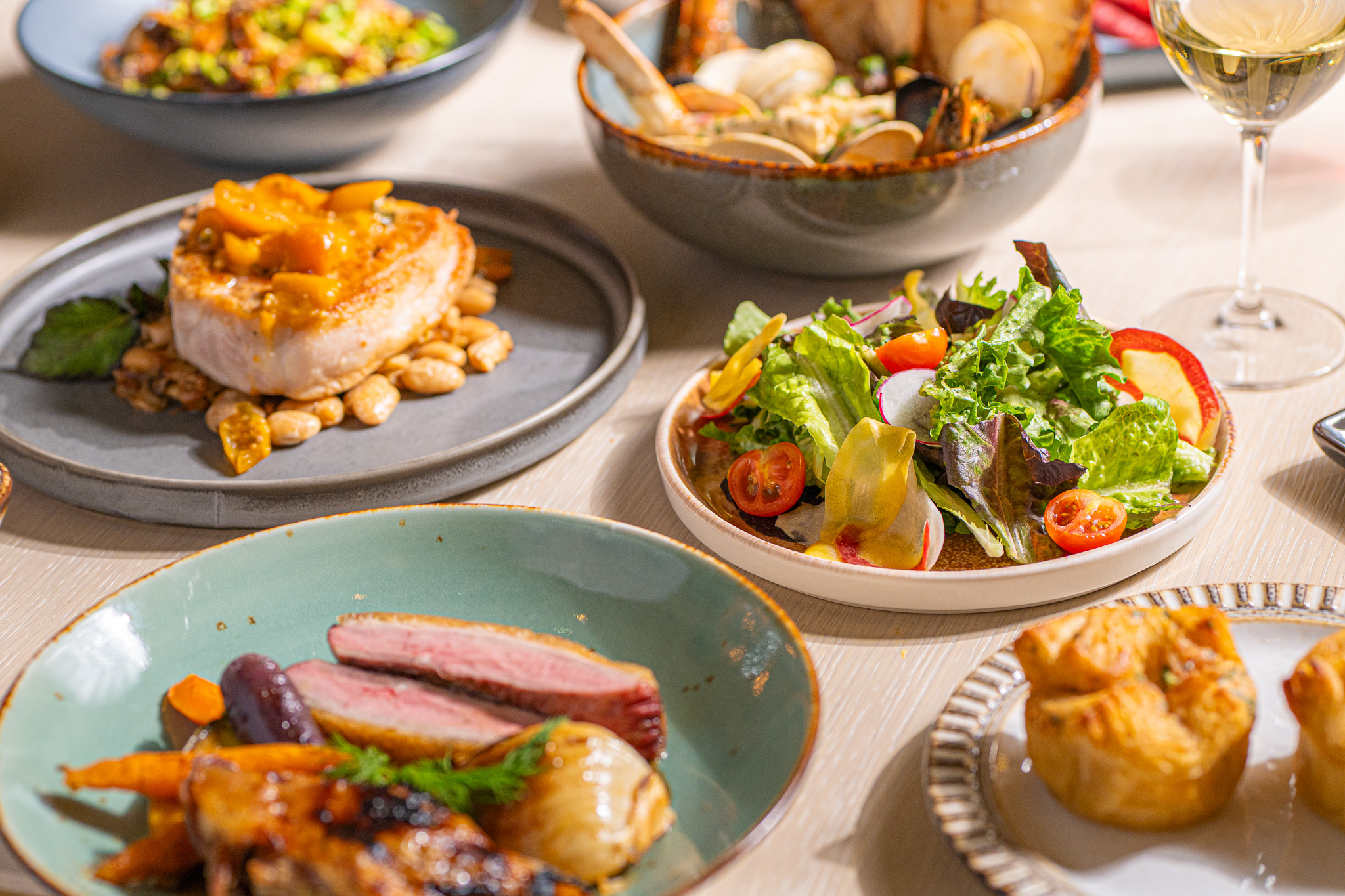 Table filled with brightly colored food at Santé restaurant