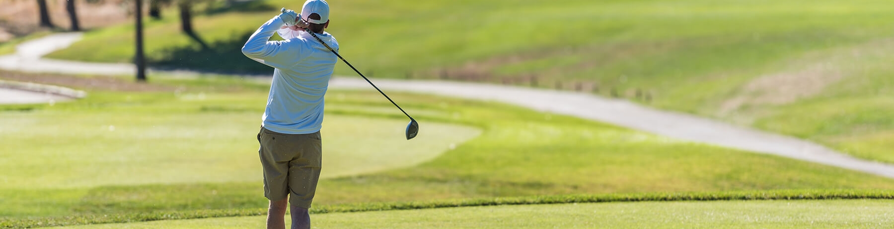 Golfer teeing off at Sonoma Golf Club
