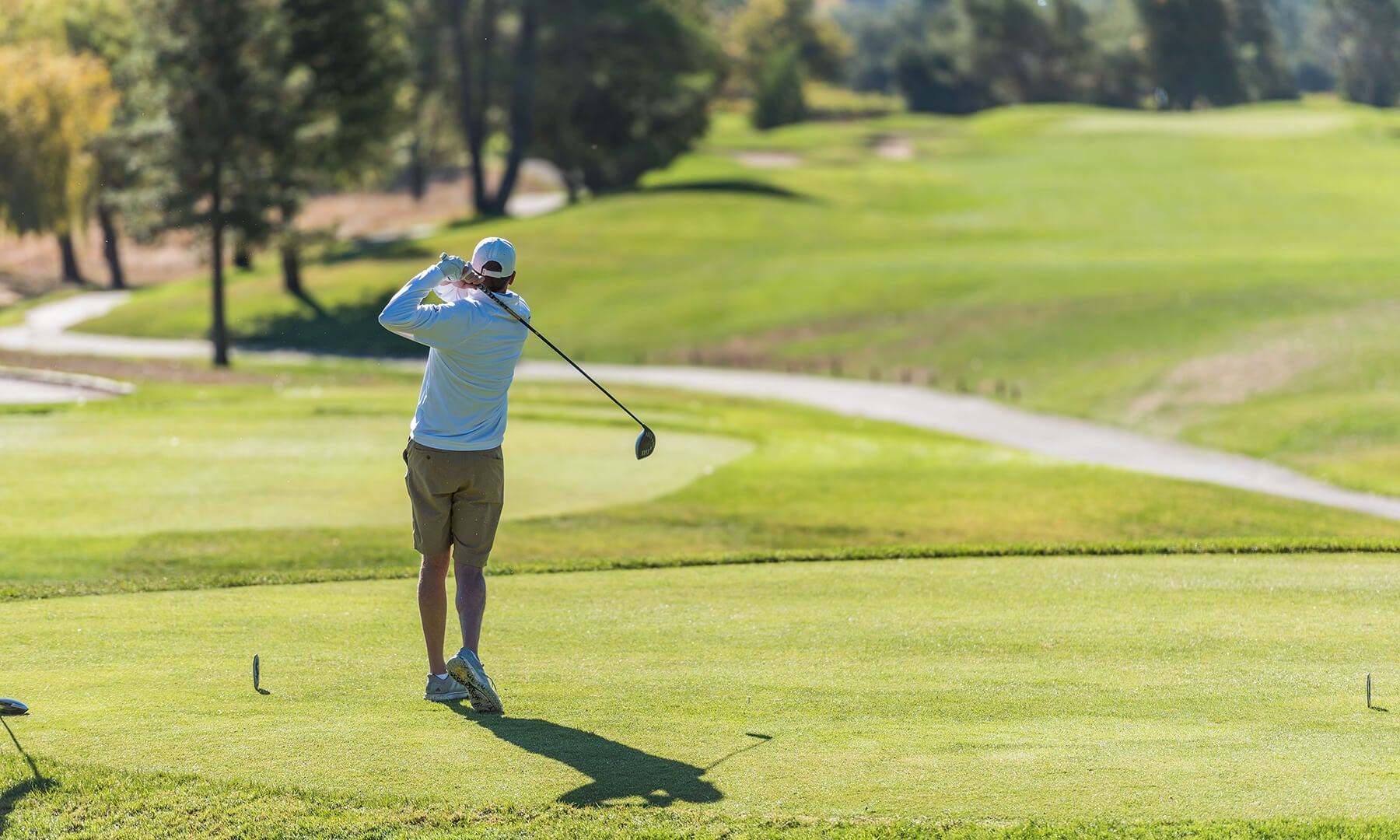 Golfer teeing off at Sonoma Golf Club