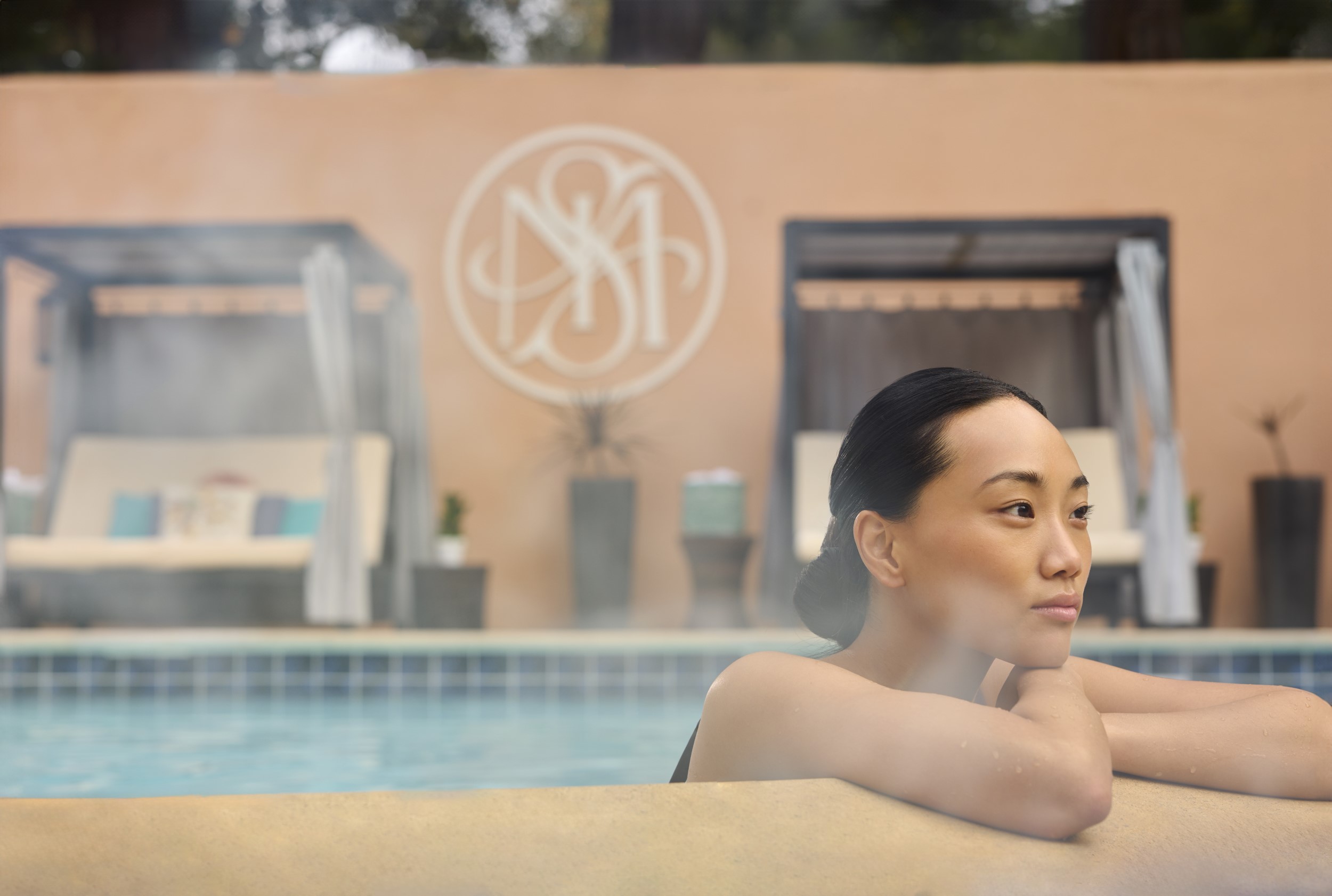 woman in pool with steam