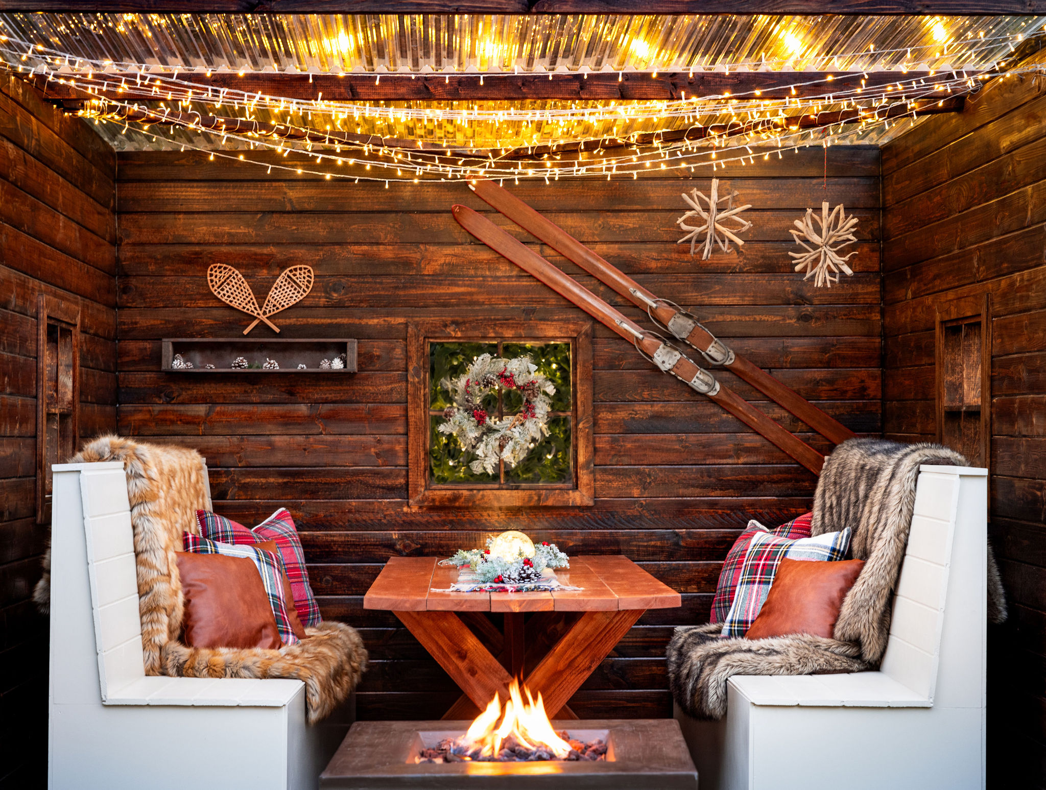 ski chalet at fairmont sonoma with fire pit, holiday décor and twinkling string lights