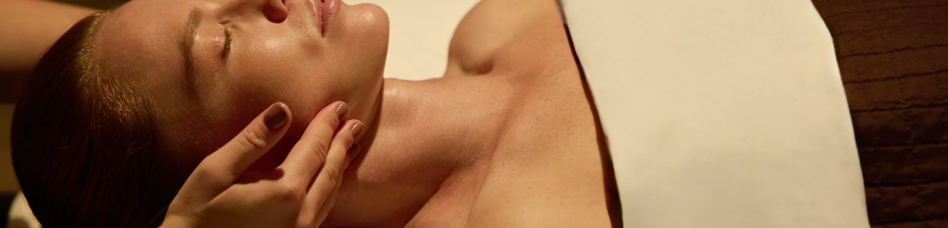 woman receiving facial