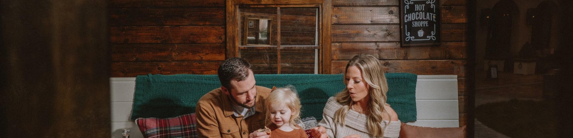 family enjoying a meal in a cozy festive setting